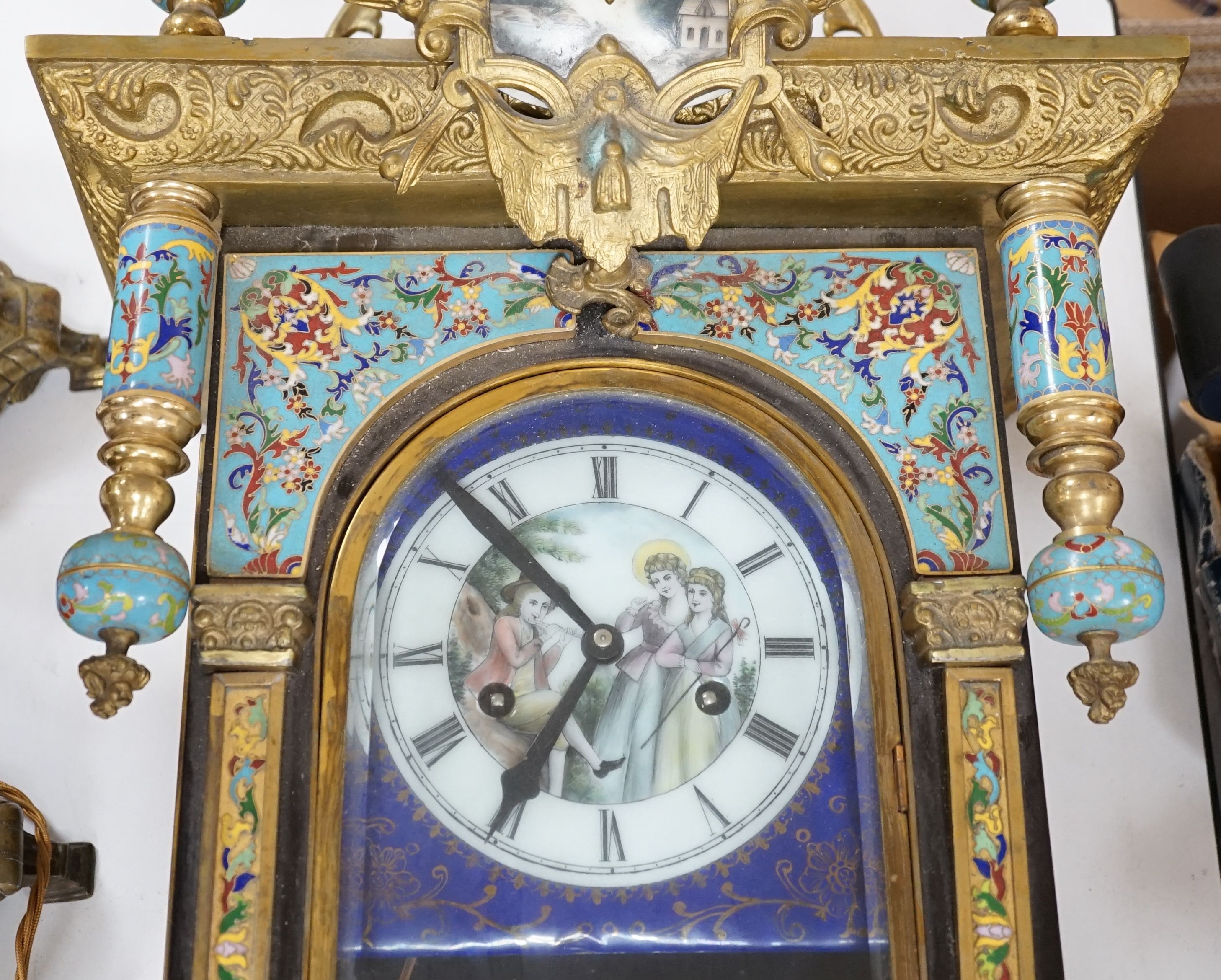 A Chinese cloisonné enamel and gilt metal wall clock, 107cm